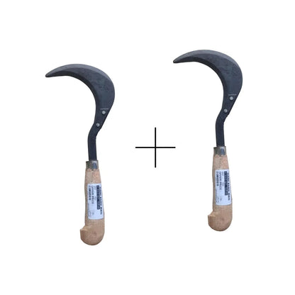 Two sickles with wooden handles on a white background