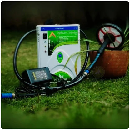 Alpha Marvel water soluble fertilizer injection pump on grass with a blurred background