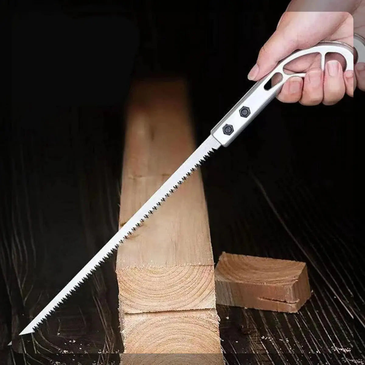 Best low budget hand saw cutting a piece of wood with a dark background
