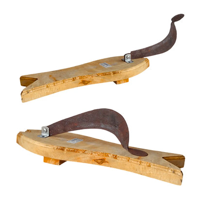 Two tradtional wooden vili with carbon steel blades on a white background