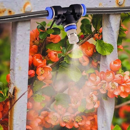 Fogger  system watering flowers in a garden
