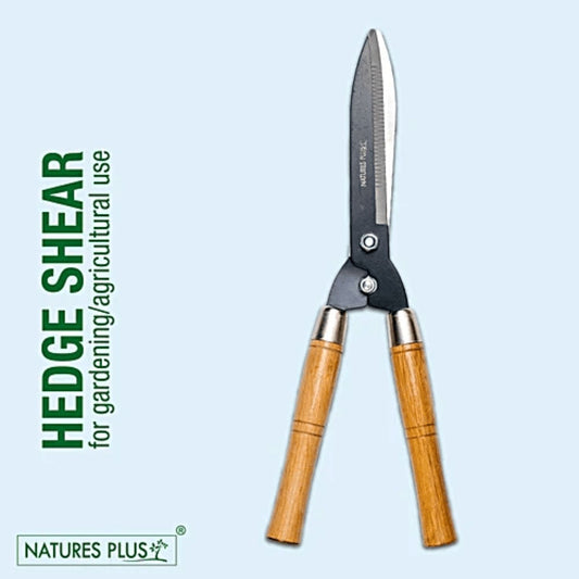 Hedge shear with wooden handles on a light blue background, featuring the brand 'Natures Plus'.