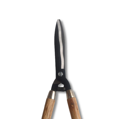 Gardening shears with wooden handles on a white background