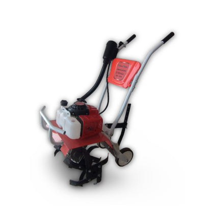 Red and black mini tiller machine on a white background
