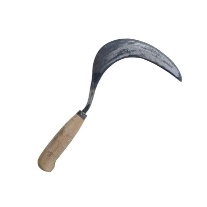 Sickle with wooden handle on a white background