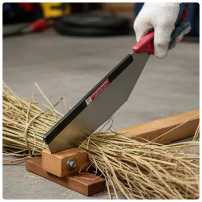 Hand using a sugacane bud cutting machine to cut straw with a blurred background