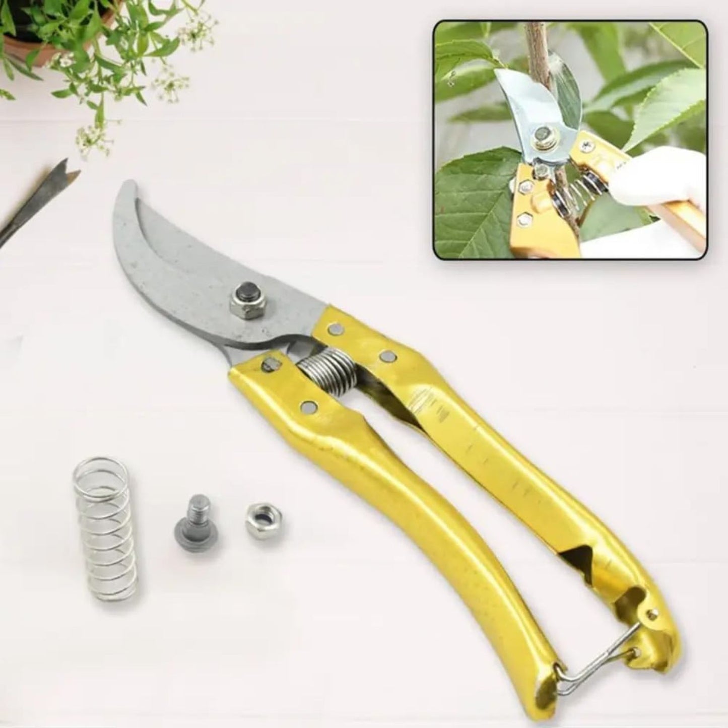 Garden pruner with yellow handle on a white background