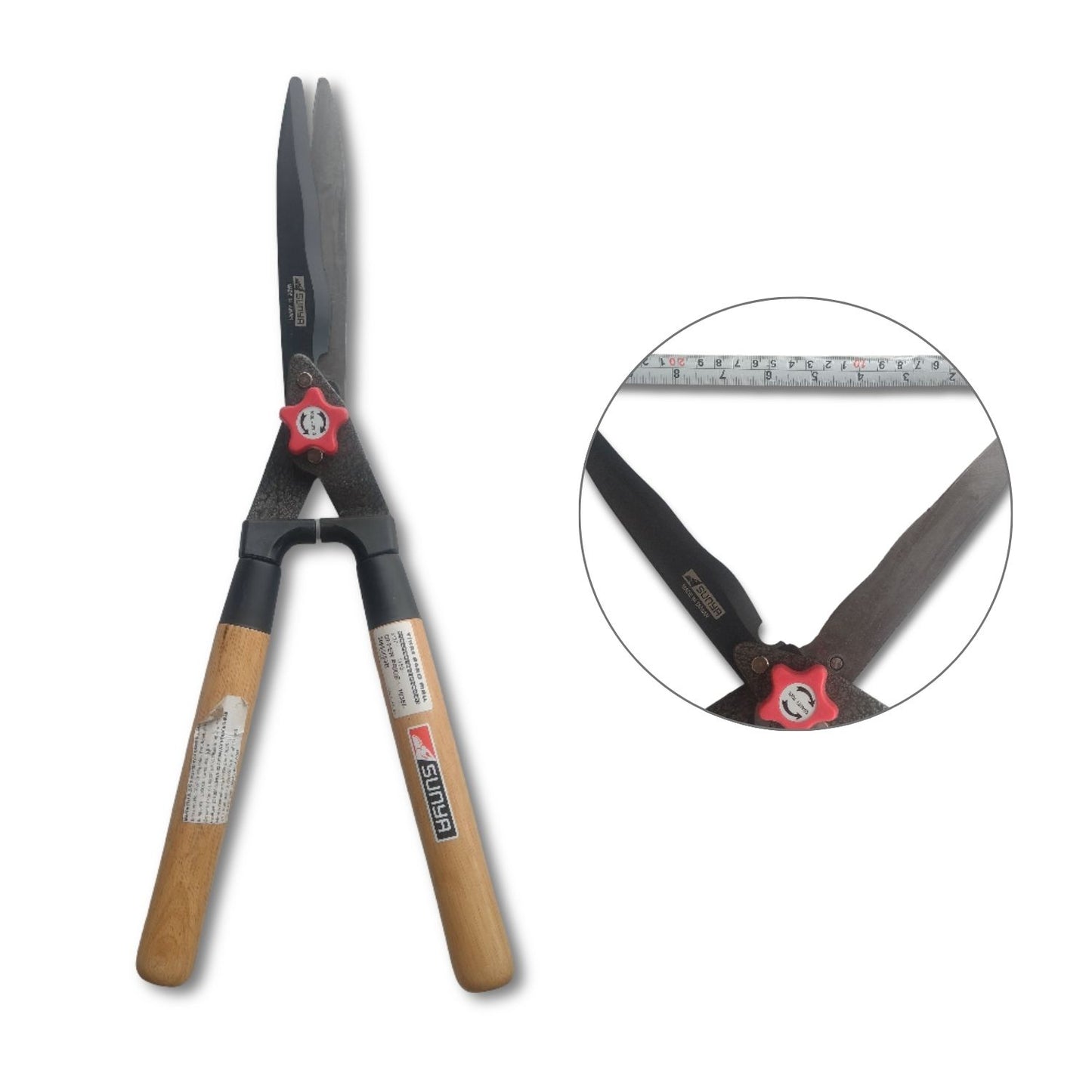 Hedge shears with wooden handles on a white background