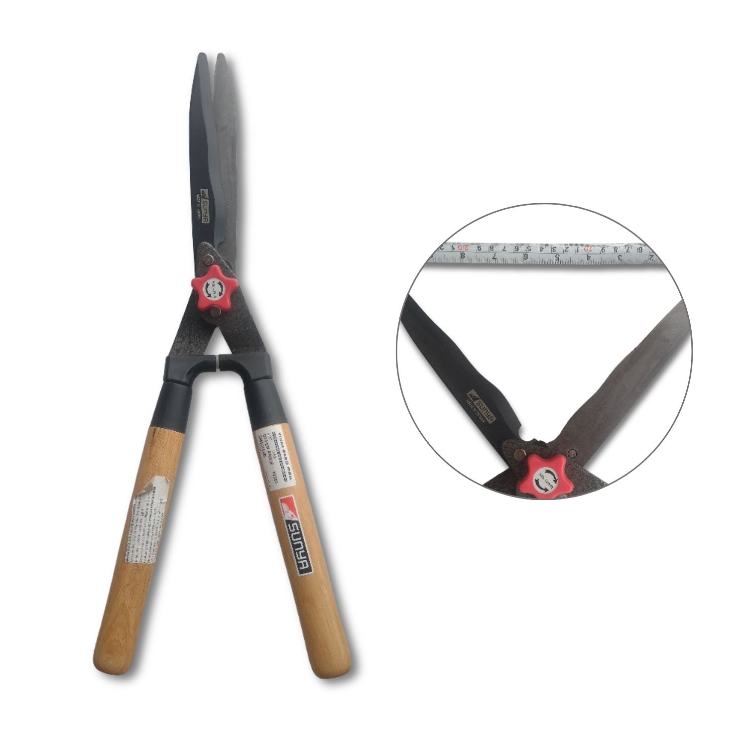 Hedge shears with wooden handles on a white background