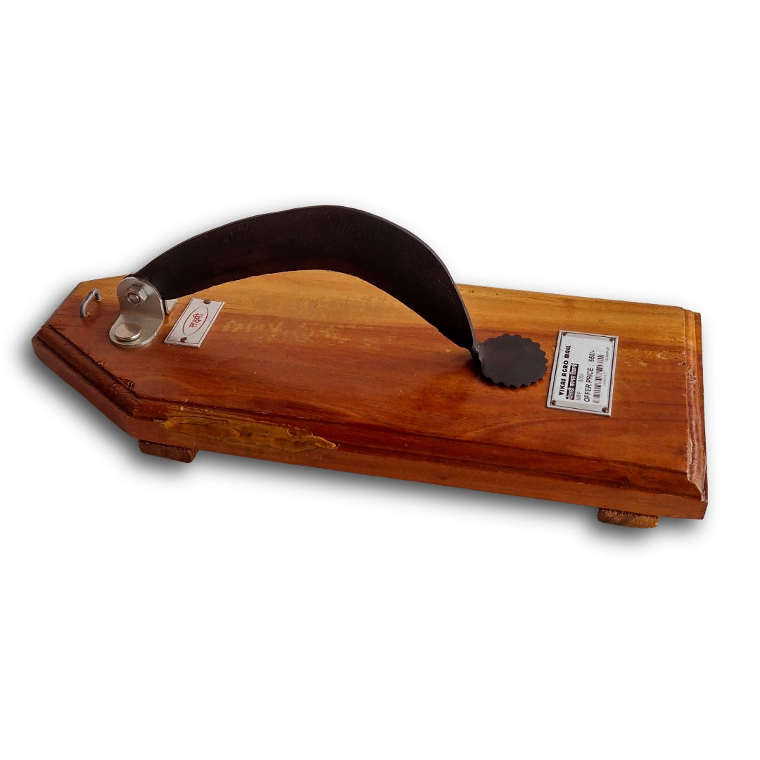 Wooden vegetable cutter on a white background