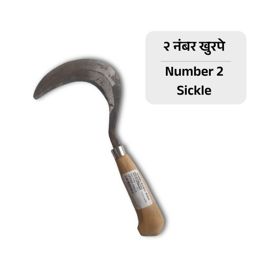 Number 2 sickle with wooden handle on a white background