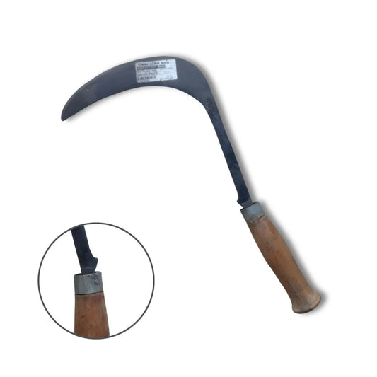 Sickle with wooden handle on a white background