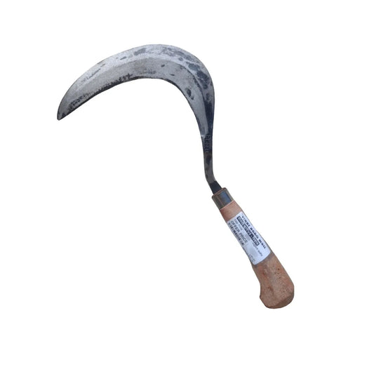 Sickle with wooden handle on a white background