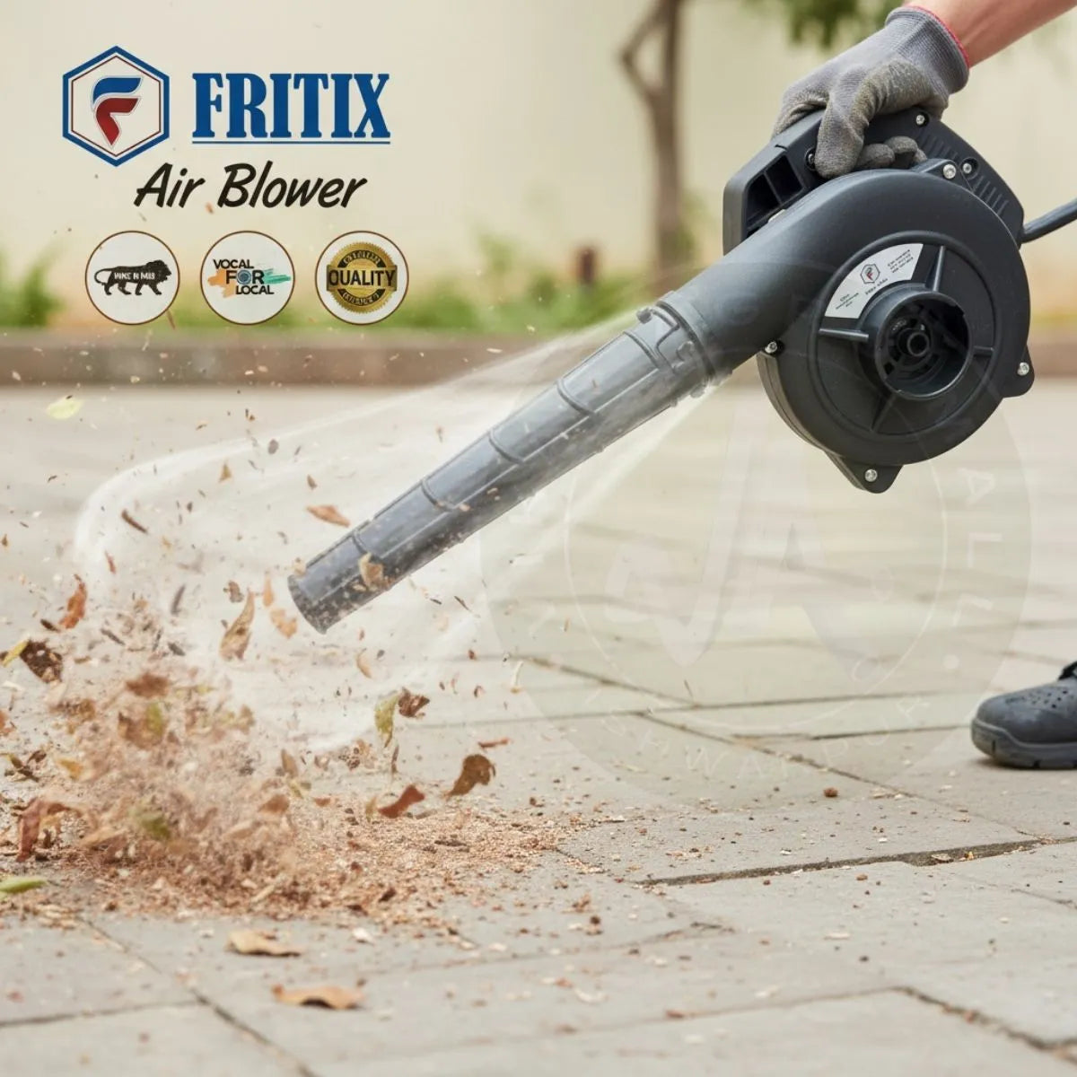 Fritix air blower being used to clear leaves on a patio