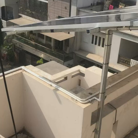 In use video of Usha pressure washer machine by a person for cleaaninng solar panels on terrace